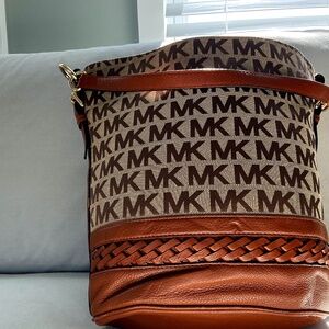 Brown leather and signature MK medium size bucket bag